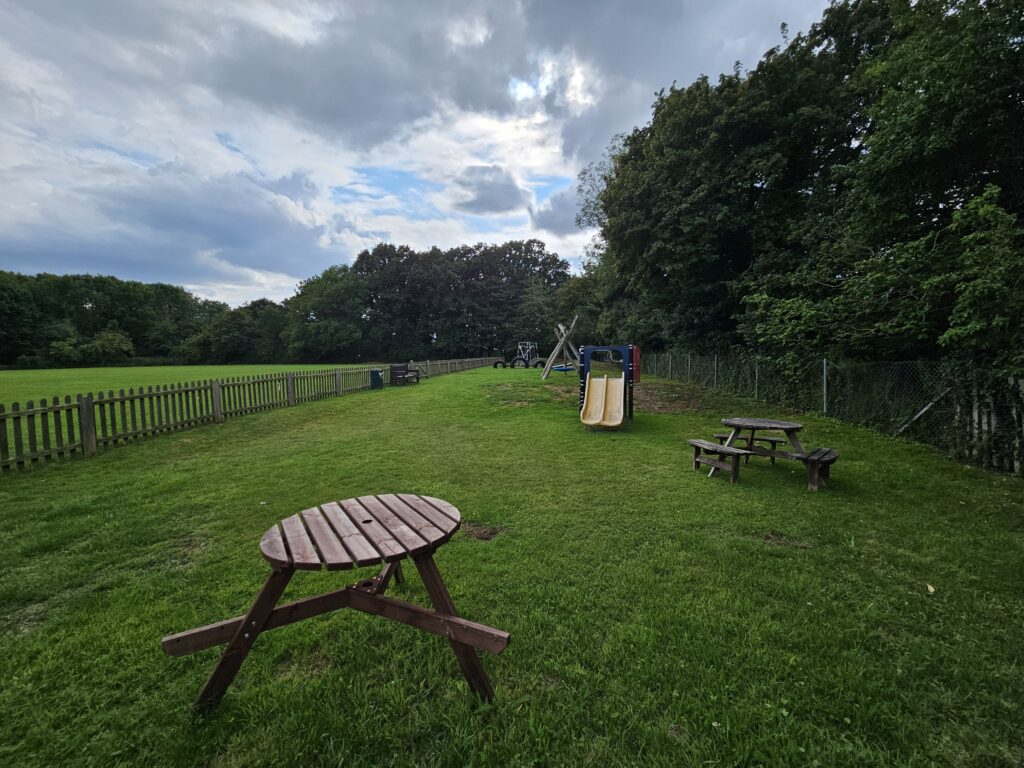 Tables within the Wetheringsett Play Area
