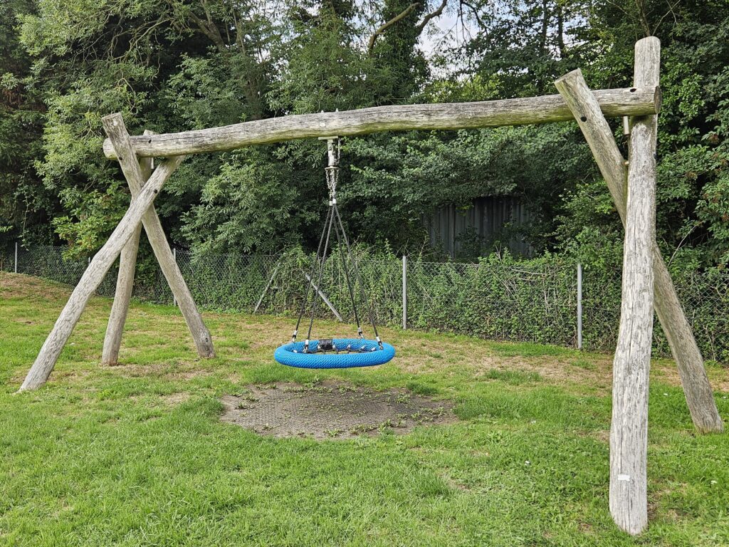 Swing within the Wetheringsett Play Area